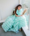 Ankle Length Green Gown With Endless Tulle Frilling To Give It A Wow Factor