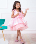 Pink Organza Dress With Full Flare Tulle Frilling At The Bottom And Statement Bow On The Side